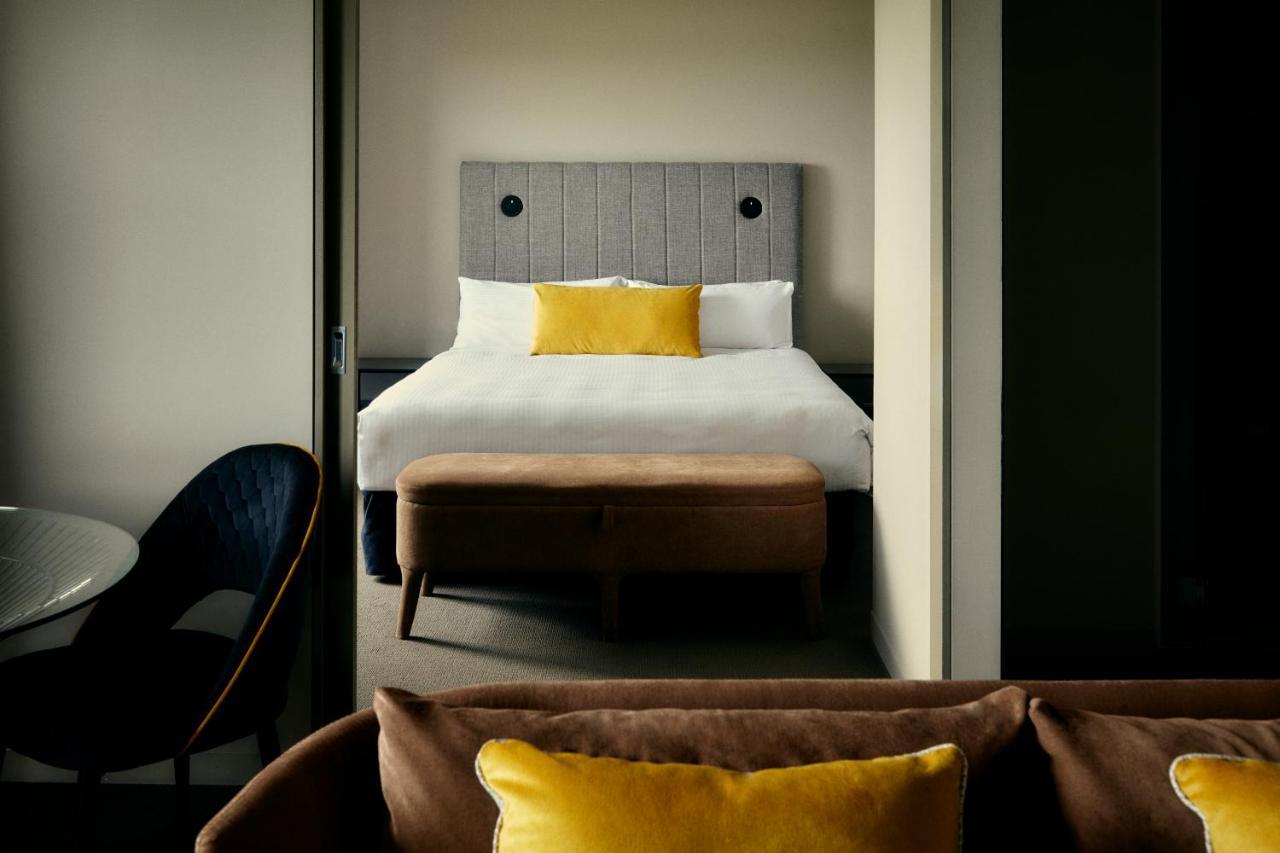 The Kinson Melbourne Exterior foto A bedroom at the hotel
